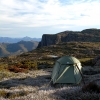 Near Mt Anne. I was unbelievably lucky on this hike. I camped in the loveliest but dumbest and most hideously exposed spot I could have picked on the plateau close to Mt Anne. Every day was cold but not wet and virtually no wind for all of the four days I was up there. But the next time I visited Mt Anne - now there is a story......