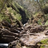 Water threads its way through the rocks.