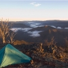 A fair way away from the nearest track. On Snowy Bluff above a valley in the Alpine National Park in Victoria at dawn.